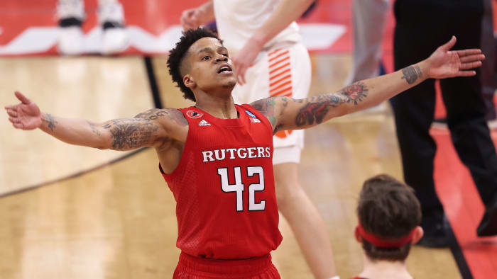 Rutgers guard Jacob Young holds out his arms during a win over Clemson